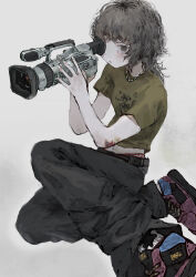 Rule 34 | 1girl, absurdres, benikusochan, black pants, camera, full body, green shirt, grey background, highres, holding, holding camera, jewelry, looking at viewer, midriff, navel, necklace, original, pants, print shirt, shirt, short sleeves, simple background, solo, white nails
