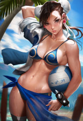 Rule 34 | 1girl, adapted costume, arm behind head, arm up, ball, bare shoulders, beach, bikini, blue bikini, blue sky, blurry, blurry background, blush, bracelet, breasts, brown eyes, brown hair, bun cover, capcom, chun-li, cleavage, coconut tree, collarbone, double bun, dutch angle, earrings, hair bun, highres, jacket, jewelry, looking at viewer, navel, ocean, outdoors, palm tree, sakimichan, sarong, see-through, short hair, sideboob, sky, solo, spiked bracelet, spikes, standing, stomach, street fighter, sunlight, swimsuit, thighhighs, tree, volleyball (object), water, water drop, wet