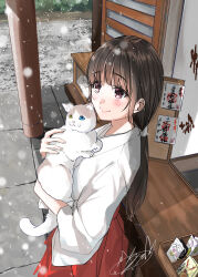 Rule 34 | 1girl, animal, blush, brown hair, bush, cat, closed mouth, commentary request, cowboy shot, day, from above, highres, holding, holding animal, holding cat, house, japanese clothes, kimono, long hair, long sleeves, miko, new year, omamori, original, outdoors, ponytail, purple eyes, red skirt, shirt, sidelocks, signature, skirt, smile, snowing, soragane (banisinngurei), standing, stone floor, white cat, white kimono