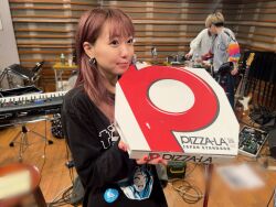Rule 34 | 1girl, earrings, guitar, indoors, instrument, jewelry, long hair, looking to the side, photo (medium), piano, pizza box, saito shuka, standing, voice actor