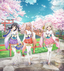 3girls bell black_hair blue_sky blush bridge brown_eyes cherry_blossoms chloe_von_einzbern dark-skinned_female dark_skin day detached_sleeves fate/kaleid_liner_prisma_illya fate_(series) folding_fan full_body gohei grey_hair hair_ornament hand_fan illyasviel_von_einzbern japanese_clothes jingle_bell kagura_suzu long_hair looking_at_viewer miko miyu_edelfelt multiple_girls nontraditional_miko official_art open_mouth orange_eyes outdoors pink_hair red_eyes sandals satou_kaori skirt sky smile thighhighs torii tree wide_sleeves zettai_ryouiki zouri