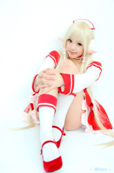 Rule 34 | 1girl, apron, asian, blonde hair, chii, chii (cosplay), chobits, cosplay, kipi-san, looking at viewer, persocom, photo (medium), simple background, socks, solo, waitress, waitress uniform, white background