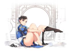 Rule 34 | 1girl, amado (shin), artist name, barefoot, black hair, black pantyhose, blue skirt, bracelet, bracelet removed, breasts, brown eyes, bun cover, capcom, china dress, chinese clothes, chun-li, closed mouth, curtains, double bun, dress, dressing, earrings, feet, from side, full body, hair bun, highres, jewelry, knee up, large breasts, leg up, looking at viewer, looking to the side, obi, pantyhose, pelvic curtain, puffy short sleeves, puffy sleeves, ribbon, sash, short hair, short sleeves, sitting, skirt, solo, spiked bracelet, spikes, street fighter, toes, white ribbon