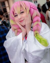 Rule 34 | 1girl, blurry, blurry background, brown hair, cosplay, female focus, green hair, highres, kanroji mitsuri, kanroji mitsuri (cosplay), kimetsu no yaiba, long hair, looking at viewer, mexican (nationality), multicolored hair, photo (medium), pink hair, pink spirit (cosplayer), smile, solo