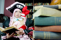 Rule 34 | 1girl, book, breasts, captain liliana, captain liliana (cosplay), chouzuki maryou, cosplay, hat, large breasts, photo (medium), pink hair, pirate, pirate hat, plump, purple eyes, queen&#039;s blade, queen&#039;s blade rebellion