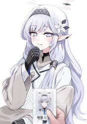 Rule 34 | 1girl, 1other, absurdres, aged down, black gloves, blue archive, blush, flower, gloves, grey hair, hair flower, hair ornament, hair tubes, hairband, halo, highres, himari (blue archive), id photo, jacket, long hair, long sleeves, looking at viewer, mole, mole under eye, pointy ears, portrait (object), pov, pov hands, purple eyes, simple background, smile, solo, solo focus, yuki (asayuki101)