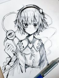 Rule 34 | 1girl, :|, art tools in frame, ballpoint pen (medium), blouse, blush, buttons, closed mouth, commentary, cropped torso, expressionless, eyebrows hidden by hair, frilled shirt collar, frilled sleeves, frills, greyscale, hair ornament, hairband, hand up, heart, heart button, heart hair ornament, komeiji satori, long sleeves, looking at viewer, monochrome, photo (medium), ribbon trim, shirt, short hair, solo, takoiro, third eye, touhou, traditional media, upper body, wide sleeves