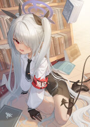 Rule 34 | 1girl, angry, armband, black gloves, black necktie, black skirt, black socks, blue archive, book, bookshelf, boots, collared shirt, demon tail, gloves, grey hair, halo, highres, iori (blue archive), knee boots, kneehighs, looking at viewer, muwei sansan, necktie, pleated skirt, red armband, red eyes, shirt, skirt, socks, solo, tail, tiles, twintails, white shirt