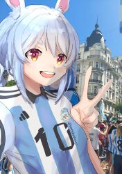 Rule 34 | 1girl, 2022, 2022 fifa world cup, absurdres, animal ears, argentina, argentinian flag, argentinian flag print, blue hair, blush, braid, breasts, city, extra, flag print, happy, highres, hikimayu, hololive, masshumaro, open mouth, parted hair, photo background, rabbit-shaped pupils, rabbit ears, rabbit girl, red eyes, shirt, short eyebrows, sidelocks, small breasts, smile, solo focus, striped clothes, striped shirt, swept bangs, symbol-shaped pupils, thick eyebrows, twin braids, usada pekora, v, vertical-striped clothes, vertical-striped shirt, virtual youtuber, world cup