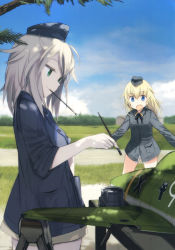 Rule 34 | 2girls, absurdres, blonde hair, blue eyes, brush, elfriede schreiber, garrison cap, green eyes, grey hair, hat, helma lennartz, highres, long hair, military, military uniform, multiple girls, non-web source, official art, open mouth, outdoors, shade, shimada fumikane, strike witches: suomus misfits squadron, striker unit, uniform, world witches series