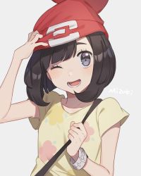 Rule 34 | 1girl, beanie, black hair, character name, creatures (company), game freak, grey background, hand on headwear, hat, highres, nintendo, one eye closed, open mouth, pokemon, pokemon sm, red hat, selene (pokemon), short hair, short sleeves, simple background, solo, unapoppo, upper body, z-ring
