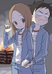 Rule 34 | 1boy, 1girl, absurdres, black hair, blue jacket, blue pants, blush, bonfire, brown eyes, brown hair, burning, child, closed mouth, commentary request, fingernails, fire, forehead, highres, holding hands, jacket, karakai jouzu no takagi-san, long hair, long sleeves, looking away, looking up, name tag, nishikata, official art, open clothes, open jacket, pants, parted bangs, shirt, sleeves past wrists, smile, takagi-san, track jacket, track pants, track suit, white shirt, yamamoto souichirou