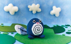 Rule 34 | amigurumi (medium), asako ito, black eyes, blue sky, cloud, cloudy sky, commentary, creature, creatures (company), day, english commentary, game freak, gen 1 pokemon, lily pad, nature, nintendo, outdoors, photo (medium), pokemon, pokemon (creature), pokemon tcg, poliwag, sky, solo, standing, third-party source, unconventional media