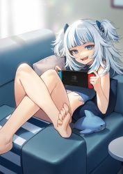 Rule 34 | 1girl, :d, absurdres, bare arms, bare legs, bare shoulders, barefoot, blue eyes, blue shirt, chair, crop top, feet, gawr gura, hair ornament, highres, holding, hololive, hololive english, legs up, long hair, looking at viewer, lying, midriff, mmlyno, multicolored hair, nintendo switch, on back, on chair, open mouth, reclining, sharp teeth, shirt, sitting sideways, sleeveless, sleeveless shirt, smile, soles, solo, streaked hair, teeth, toes, two side up, virtual youtuber, white hair