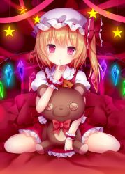 Rule 34 | 1girl, amashiro natsuki, bad id, bad pixiv id, blonde hair, button eyes, buttons, finger to mouth, flandre scarlet, frilled skirt, frills, hat, head tilt, highres, looking at viewer, mob cap, on bed, pillow, puffy short sleeves, puffy sleeves, red eyes, short hair, short sleeves, side ponytail, sitting, skirt, skirt set, solo, star (symbol), stuffed animal, stuffed toy, teddy bear, touhou, wariza, wings, wrist cuffs