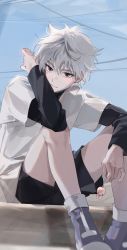 Rule 34 | 1boy, 41097772s, absurdres, black eyes, black shorts, candy, closed mouth, food, grey hair, hair between eyes, highres, holding, hunter x hunter, killua zoldyck, korean commentary, lollipop, long sleeves, looking at viewer, male focus, purple footwear, shirt, shoes, shorts, sitting, solo, spiked hair