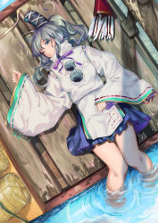 Rule 34 | 1girl, arrow (projectile), bare legs, blue eyes, blue skirt, bow (weapon), grey hair, hat, highres, japanese clothes, kariginu, l!bra, long sleeves, lying, mononobe no futo, on back, one eye closed, pom pom (clothes), ponytail, ribbon, skirt, solo, tate eboshi, touhou, water, water surface, weapon, wide sleeves, wooden bridge, wooden floor
