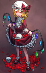 Rule 34 | 1girl, alternate costume, blonde hair, bobby socks, bow, closed mouth, crystal, flandre scarlet, frilled shirt collar, frills, full body, gothic lolita, hat, hat bow, hat ribbon, light smile, lolita fashion, mary janes, medium hair, mob cap, multicolored wings, one side up, puffy short sleeves, puffy sleeves, red bow, red eyes, red footwear, red petals, red ribbon, red shirt, red skirt, remi (isizaki0204), ribbon, ribbon-trimmed headwear, ribbon trim, shirt, shoes, short sleeves, simple background, skirt, skirt basket, skull, socks, solo, standing, touhou, white hat, white socks, wings