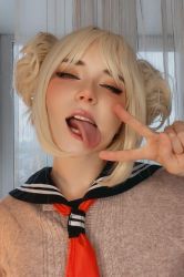 Rule 34 | 1girl, blonde hair, boku no hero academia, cosplay, eyeshadow, female focus, makeup, photo (medium), real life, school uniform, solo, source request, sweetie fox, toga himiko, toga himiko (cosplay), tongue, tongue out, v, wig