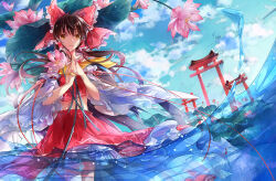Rule 34 | 1girl, ascot, bow, brown hair, cloud, commentary request, day, detached sleeves, flower, frilled bow, frilled hair tubes, frills, hair bow, hair tubes, hakurei reimu, holding, holding flower, lily pad, long hair, looking at viewer, multiple torii, own hands together, red bow, red skirt, skirt, skirt set, solo, tg, torii, touhou, water, water lily flower, yellow ascot, yellow eyes