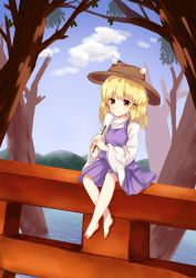 1girl barefoot blonde_hair blue_sky breasts brown_eyes brown_hat closed_mouth cloud cloudy_sky dress gohei hands_up hat lake long_sleeves looking_at_viewer medium_breasts moriya_suwako mountain purple_dress shirt short_hair sitting sky solo torii touhou tree water white_shirt wide_sleeves yellow_eyes zhi_xixi