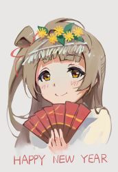 Rule 34 | 1girl, blush, brown eyes, brown hair, closed mouth, commentary request, english text, hand fan, flower, folding fan, grey background, hair flower, hair ornament, hand up, haoni, happy new year, holding, holding fan, long hair, looking at viewer, love live!, love live! school idol project, new year, one side up, simple background, smile, solo, upper body, yellow flower