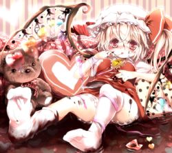 Rule 34 | 1girl, alternate wings, asymmetrical hair, bad id, bad pixiv id, blonde hair, blush, chocolate, emia, emia (castilla), female focus, flandre scarlet, food, food on face, hat, hat ribbon, heart, heart-shaped pillow, lying, no shoes, on back, open mouth, pillow, red eyes, ribbon, shirt, short hair, side ponytail, skirt, solo, stuffed animal, stuffed toy, teddy bear, embodiment of scarlet devil, tongue, tongue out, touhou, upshirt, wings, wrist ribbon