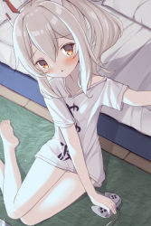 Rule 34 | 1girl, ayanami (azur lane), azur lane, bare legs, barefoot, bed, bed sheet, blush, carpet, collarbone, commentary request, controller, from above, game controller, head tilt, headgear, irokari, long hair, looking at viewer, looking up, orange eyes, oversized clothes, oversized shirt, pajamas, parted lips, ponytail, shirt, sidelocks, silver hair, sitting, solo, thighs, translation request, wariza, white shirt, wooden floor