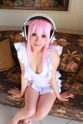 Rule 34 | 1girl, breasts, cosplay, large breasts, photo (medium), pink hair, super sonico