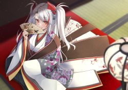 Rule 34 | 1girl, architecture, azur lane, east asian architecture, floral print, flower, folding fan, from above, gekato, hand fan, headgear, highres, holding, holding fan, indoors, japanese clothes, karaginu mo, kimono, layered clothes, layered kimono, long hair, looking at viewer, looking up, multicolored hair, orange eyes, pink flower, prinz eugen (azur lane), red hair, solo, streaked hair, two-tone hair, white hair, wide sleeves