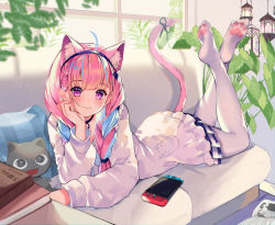 1girl, :3, animal ear fluff, animal ears, artist name, blue hair, blue skirt, blush, book, braid, cat ears, cat tail, choker, commentary, couch, crossed ankles, cushion, day, diamond-shaped pupils, diamond (shape), eyebrows visible through hair, hairband, hand on own chin, head rest, highres, hololive, jacket, lantern, legs up, long hair, long sleeves, looking at viewer, lying, minato aqua, multicolored hair, nintendo switch, no shoes, on stomach, pantyhose, paw print, paw print socks, pink eyes, pink hair, pink tail, plant, potted plant, print legwear, ribbon, skirt, solo, stuffed animal, stuffed cat, stuffed toy, symbol-shaped pupils, tail, tail ornament, tail ribbon, twin braids, two-tone hair, virtual youtuber, white jacket, white legwear, window, yuniiho