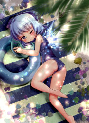 Rule 34 | 1girl, absurdres, ass, ball, beachball, blanket, blue eyes, blue hair, bow, cirno, dappled sunlight, hair bow, highres, ice, ice wings, innertube, looking at viewer, lying, matching hair/eyes, on side, one-piece swimsuit, one eye closed, palm tree, school swimsuit, shell, solo, sunlight, swim ring, swimsuit, touhou, tree, volcano (liao), wings