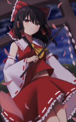 Rule 34 | 1girl, absurdres, annoyed, bow, brown eyes, brown hair, cherry blossoms, detached sleeves, falling petals, from below, gohei, hair bow, hakurei reimu, highres, holding, holding gohei, large bow, legs, looking at viewer, nontraditional miko, petals, red bow, red shirt, red skirt, shinto, shirt, skirt, solo, stomach, szl, torii, touhou, white sleeves