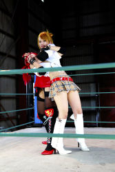 Rule 34 | 2girls, arena, blonde hair, boxing ring, breasts, candy cane (rumble roses), candy cane (rumble roses) (cosplay), chouzuki maryou, cleavage, cosplay, fingerless gloves, gloves, highres, large breasts, miss spencer, miss spencer (cosplay), multiple girls, photo (medium), red hair, rumble roses, rumble roses xx, suzuka itsuki