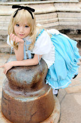 Rule 34 | 1girl, alice (alice in wonderland), alice (alice in wonderland) (cosplay), alice in wonderland, asian, bent over, blue eyes, breasts, color contacts, cosplay, kipi-san, leaning forward, long hair, looking at viewer, mole, outdoors, petite, photo (medium), small breasts, solo