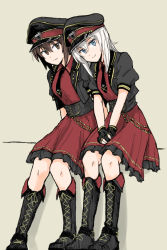 Rule 34 | 2girls, black footwear, black gloves, black headwear, black jacket, black necktie, blue eyes, boots, brown eyes, brown hair, closed mouth, collared dress, cosplay, cropped jacket, cross-laced footwear, dress, emblem, fingerless gloves, frilled dress, frills, girls und panzer, girls und panzer senshadou daisakusen!, gloves, grey hair, hat, idol, itsumi erika, itsumi erika (cosplay), jacket, knee boots, kuromorimine (emblem), lace-up boots, leaning forward, lolita fashion, looking at viewer, medium dress, medium hair, multiple girls, mutsu (layergreen), necktie, nishizumi maho, official alternate costume, peaked cap, puffy short sleeves, puffy sleeves, red dress, short hair, short sleeves, side-by-side, sitting, smile, v arms, wing collar