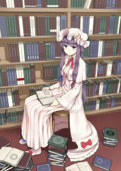 Rule 34 | 1girl, blush, book, bookshelf, bow, capelet, chair, crescent, dress, female focus, full body, hat, highres, holding, holding book, kamata yuuya, library, long hair, looking at viewer, open book, patchouli knowledge, purple eyes, purple hair, sitting, solo, too many, too many books, touhou, voile