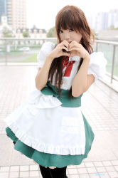 Rule 34 | 1girl, apron, asian, black pantyhose, blurry, bow, brown eyes, brown hair, cosplay, cosplay photo, depth of field, frills, heart, heart hands, jewelry, kipi-san, long hair, looking at viewer, maid, maid apron, outdoors, pantyhose, photo (medium), real life, ring, solo, standing, waist apron, waitress