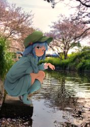 Rule 34 | 1girl, blue eyes, blue footwear, blue hair, blue shirt, blue skirt, blurry, blurry background, boots, branch, breasts, bush, cherry blossoms, commentary request, concrete, eyelashes, fishing, fishing rod, flanvia, flat cap, full body, grass, green hat, hair bobbles, hair ornament, hand on thighs, hat, heel up, highres, holding, holding branch, kawashiro nitori, long sleeves, looking at viewer, medium breasts, o3o, one side up, outdoors, petals, petals on liquid, photo background, pipeline, pocket, river, rubber boots, shirt, skirt, solo, squatting, touhou, tree