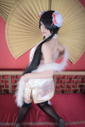 Rule 34 | 1girl, artist request, asian, bare shoulders, black hair, black thighhighs, blurry, bun cover, china dress, chinese clothes, color contacts, cosplay, date a live, depth of field, double bun, dress, feather boa, hair bun, hair over one eye, halter dress, halterneck, indoors, kneeling, lace, lace-trimmed legwear, lace trim, long hair, looking at viewer, looking back, makeup, mascara, no shoes, parted lips, photo (medium), red eyes, short china dress, side slit, sitting, sleeveless, sleeveless dress, solo, thighhighs, tokisaki kurumi, tokisaki kurumi (cosplay), twintails, zettai ryouiki