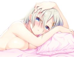 Rule 34 | 1girl, blue eyes, blush, breasts, cleavage, collarbone, gunp, hair between eyes, hair ornament, hairclip, hamakaze (kancolle), hand on own head, kantai collection, large breasts, looking at viewer, lying, messy hair, nude, on stomach, parted lips, pillow, short hair, silver hair, solo, under covers