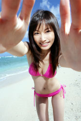 Rule 34 | 1girl, asian, beach, bikini, highres, looking at viewer, nagasawa nao, ocean, outdoors, photo (medium), side-tie bikini bottom, swimsuit
