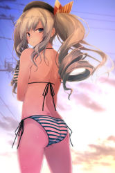 Rule 34 | 1girl, ass, beret, bikini, black hat, cloud, commentary request, from behind, gradient sky, grey eyes, hat, kantai collection, kashima (kancolle), looking at viewer, looking back, power lines, side-tie bikini bottom, sidelocks, silver hair, sky, solo, string bikini, striped bikini, striped clothes, sunset, swimsuit, tsurime, twintails, wavy hair, yumesato makura