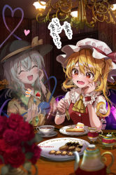 Rule 34 | 2girls, ascot, black headwear, blonde hair, blush, bow, buttons, cake, cake slice, chandelier, closed eyes, collar, commentary request, cup, diamond button, flandre scarlet, flower, flower pot, food, fork, frilled collar, frilled sleeves, frills, fujiwara aoi, furrowed brow, green hair, hand on own face, hat, hat ribbon, heart, heart of string, holding, holding fork, invisible, komeiji koishi, long sleeves, mob cap, multiple girls, open mouth, plate, puffy short sleeves, puffy sleeves, red bow, red eyes, red ribbon, red vest, ribbon, rose, saucer, shirt, short sleeves, speech bubble, strawberry shortcake, sweatdrop, table, teacup, teapot, touhou, vest, white headwear, wide sleeves, wings, wrist cuffs, yellow ascot, yellow shirt