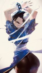 Rule 34 | 1girl, arms up, ass, beige background, black hair, bracelet, capcom, chinese clothes, chun-li, double bun, from behind, highres, huge ass, jewelry, looking at viewer, looking back, pantyhose, shimoguchi tomohiro, solo, spiked bracelet, spikes, street fighter