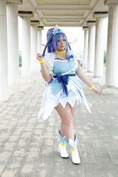 Rule 34 | 1girl, ankle boots, asian, blue eyes, blue hair, boots, bow, bracelet, breasts, choker, chouzuki maryou, cosplay, cure diamond (cosplay), dokidoki! precure, dress, headpiece, highres, jewelry, large breasts, crossed legs, long hair, magical girl, matching hair/eyes, photo (medium), plump, ponytail, precure, puffy short sleeves, puffy sleeves, ribbon, short sleeves, solo, tiara