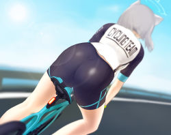Rule 34 | 1girl, absurdres, animal ears, ass, ass focus, bad id, bad pixiv id, bicycle, bike jersey, bike shorts, blue archive, blue sky, blurry, blurry background, cat ears, clothes writing, day, depth of field, from behind, halo, highres, janku, lens flare, outdoors, riding, riding bicycle, shiroko (blue archive), shiroko (cycling) (blue archive), short hair, silver hair, sky, solo