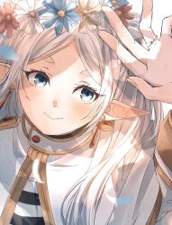 Rule 34 | 1girl, arm up, blush, capelet, close-up, commentary, commentary request, dangle earrings, dappled sunlight, earrings, elf, flower, frieren, gold trim, green eyes, hand up, head wreath, highres, jewelry, omichi 1219, parted lips, pointy ears, ring, shirt, short eyebrows, smile, solo, sousou no frieren, striped clothes, striped shirt, sunlight, symbol-only commentary, thick eyebrows, upper body, white capelet