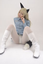 Rule 34 | 1girl, animal ears, blonde hair, cosplay, eila ilmatar juutilainen, fake animal ears, fox ears, looking at viewer, military, military uniform, pantyhose, photo (medium), sitting, spread legs, strike witches, tail, uniform, wig, world witches series