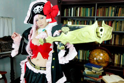 Rule 34 | 1girl, bow (weapon), breasts, captain liliana, captain liliana (cosplay), chouzuki maryou, cosplay, crossbow, hat, large breasts, photo (medium), pink hair, pirate, pirate hat, plump, purple eyes, queen&#039;s blade, queen&#039;s blade rebellion, weapon